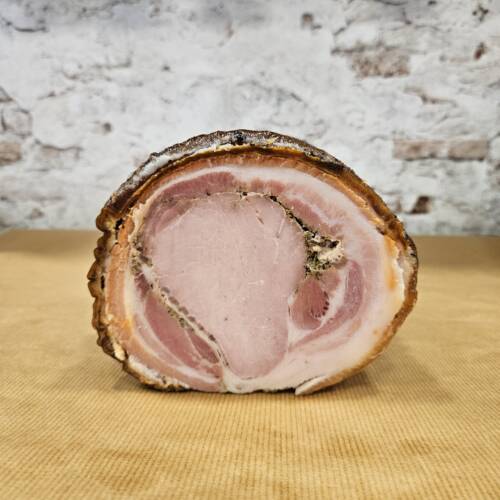 Porqueta, cerdo cocido al horno de leña con hierbas provensales.