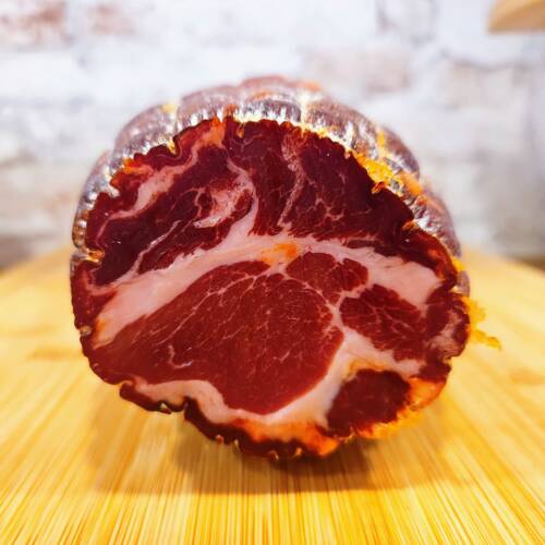 Auténtico Capocollo Picante de Calabria DOP: embutido italiano curado con especias, sabor intenso y picante. ¡Compra online en nuestra tienda!