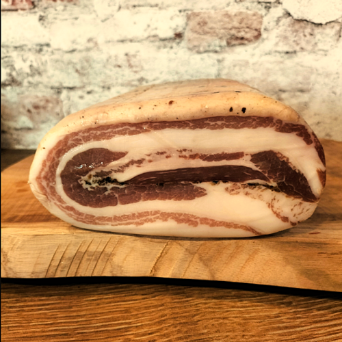 Panceta con trufa italiana cortada en lonchas